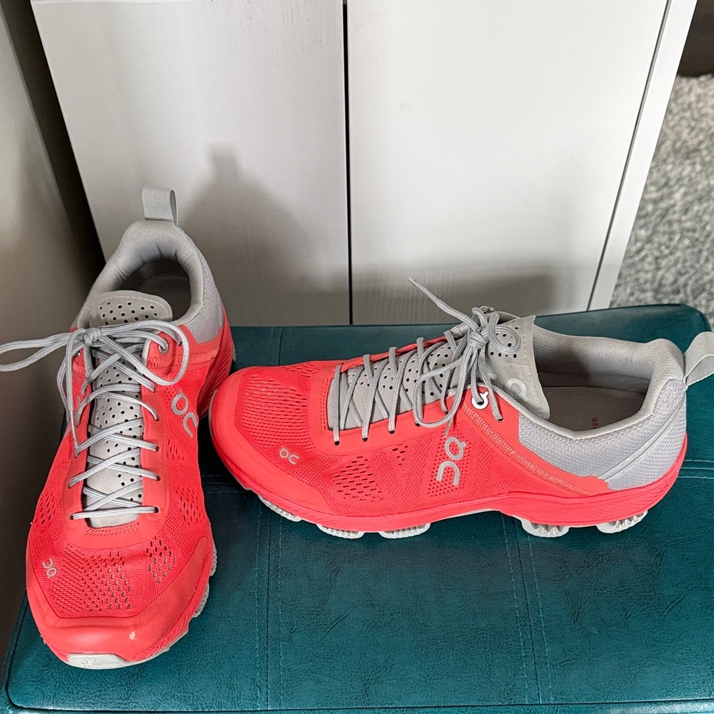 On Running Vibrant Coral and Light Gray Shoes
